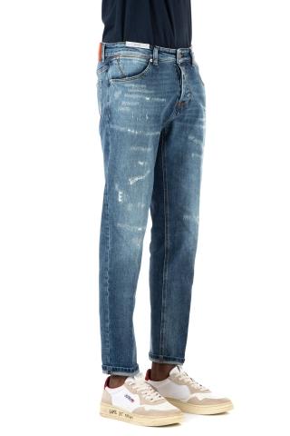Jeans in cotone con rotture etichetta arancione mod. reggae